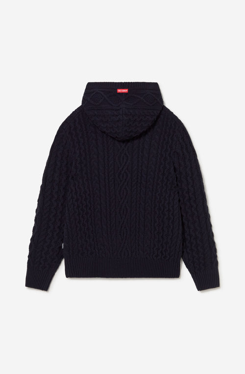 Sudadera unisex de punto trenzado azul marino con capucha y fit relajado de inspiración après ski.