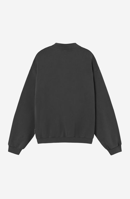 Sudadera Zipper Washed Après Ski Black negra con cuello alto, media cremallera y bordado Après Ski en el pecho.