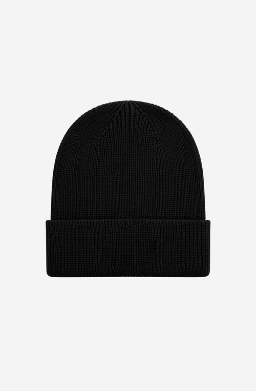 Gorro de punto negro Kaotiko Breeze Black con vuelta ancha y bordado azul de una figura con ojos.