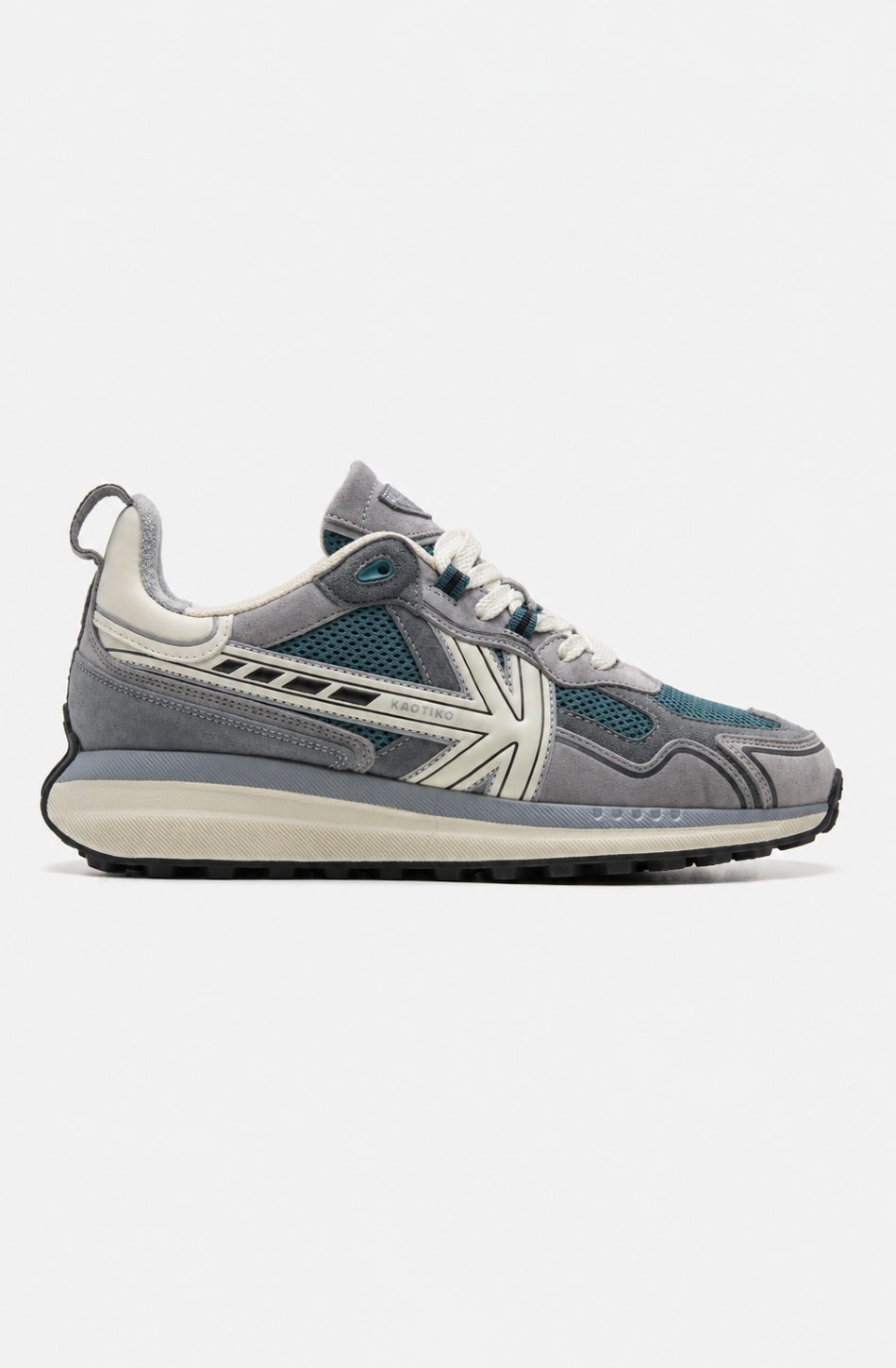 Zapatillas Kaotiko Vancouver Tech Mid Grey en tonos grises con malla verde petróleo, detalles en blanco roto, logo lateral y suela elevada.