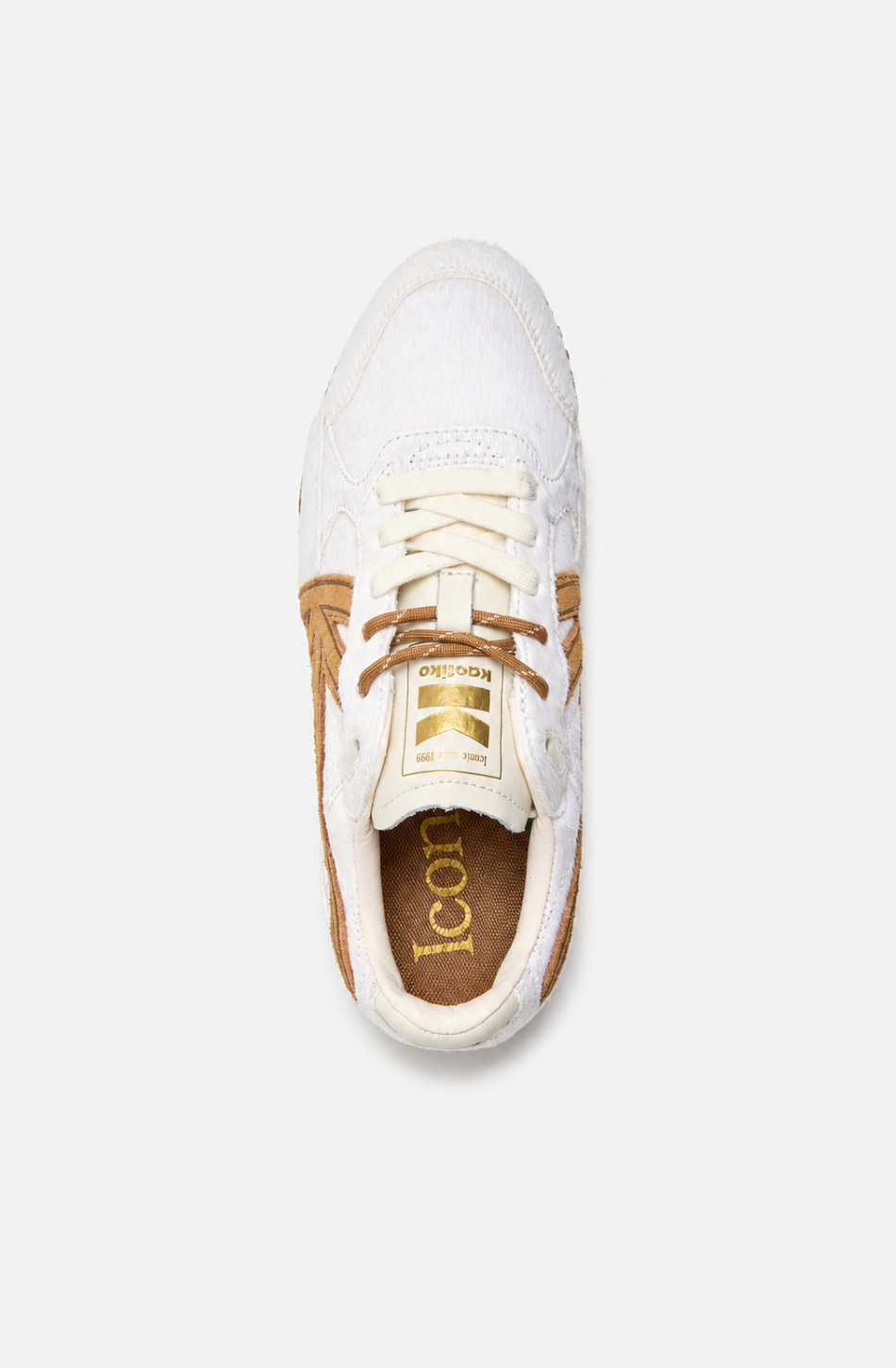 Zapatillas Seattle Pony White de pelo blanco con detalles marrones y suela de inspiración retro.