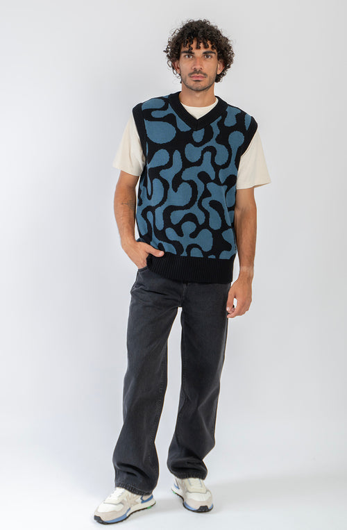 Chaleco unisex de punto con diseño jacquard azul y negro.