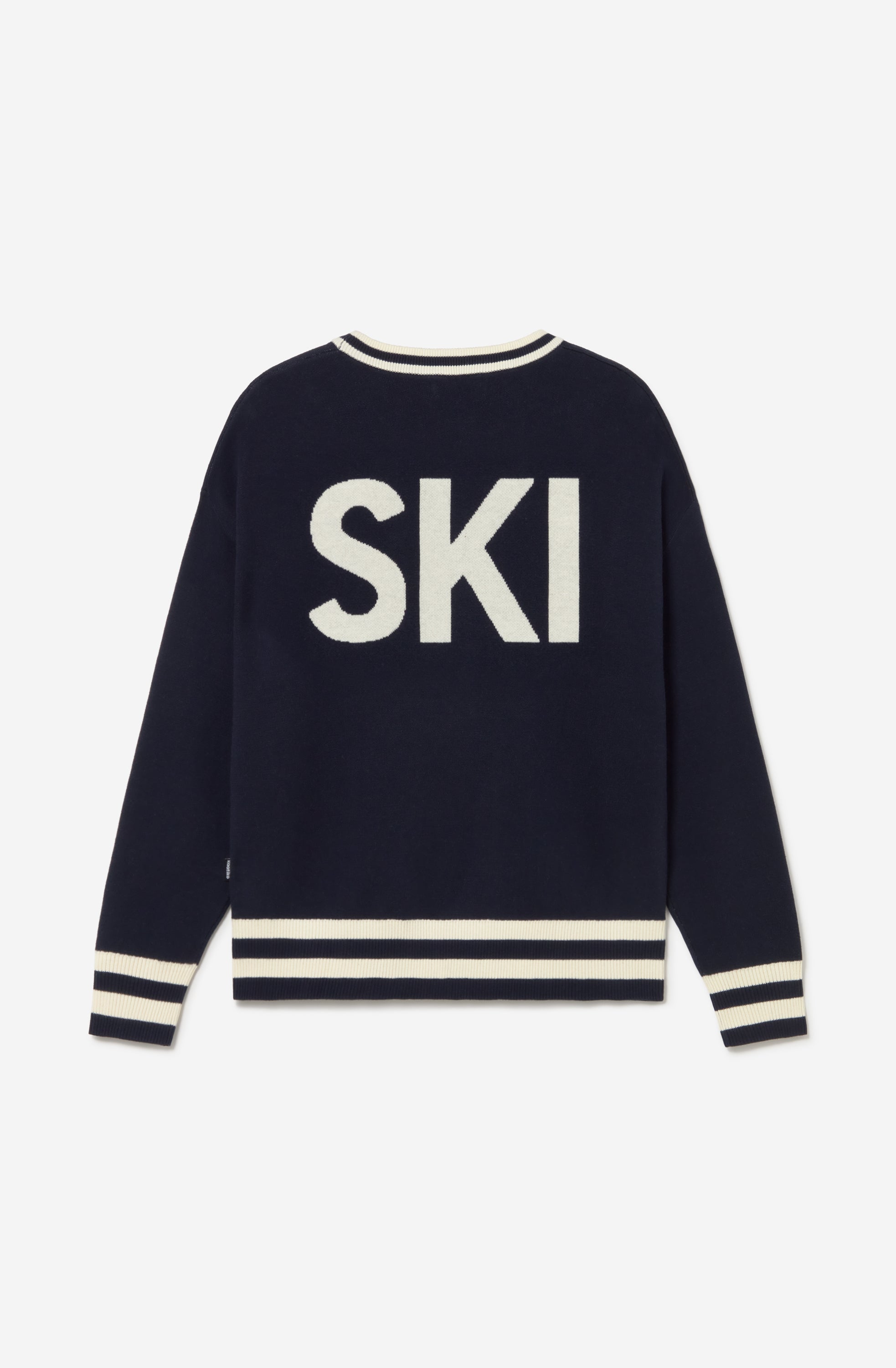 Jersey unisex azul marino de punto con gráfico APRÈS en el frontal, SKI en la espalda y detalles de canalé a contraste.